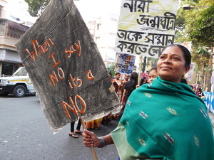 3 woman with sign 3