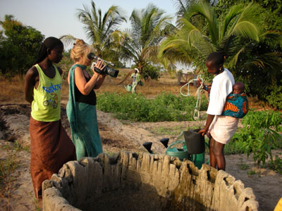 Vijali filming women at the well 