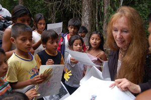 Vijali giving out drawing from the children in New Mexico 